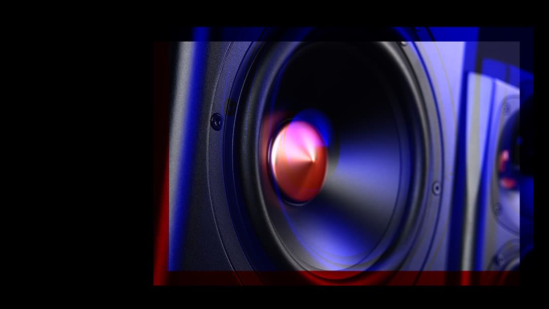 A channel shift image of a speaker on black backgraound