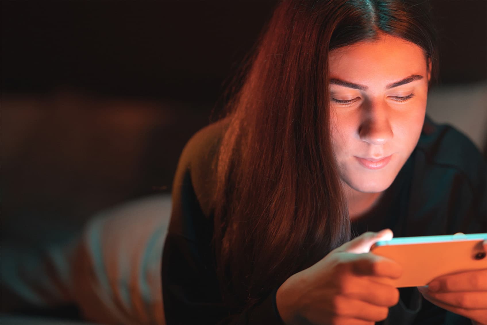 Woman streaming content on phone