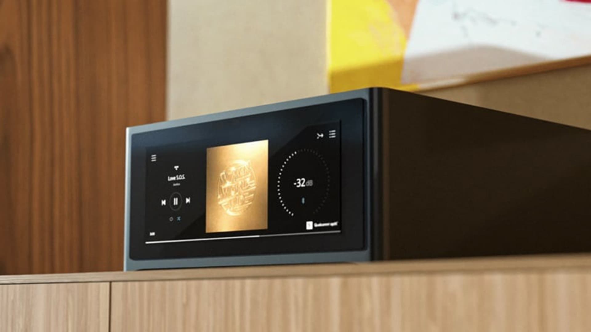 NAD M10 V3 in black, angle view in a living room, color image